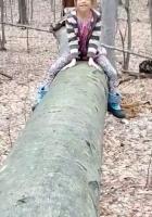 alexis on a log